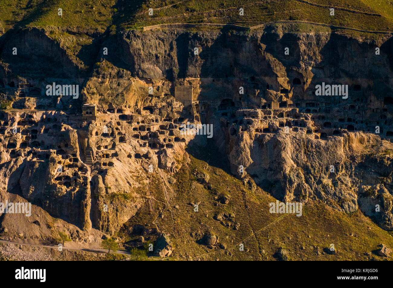 Ancient homes in mountainside Stock Photo