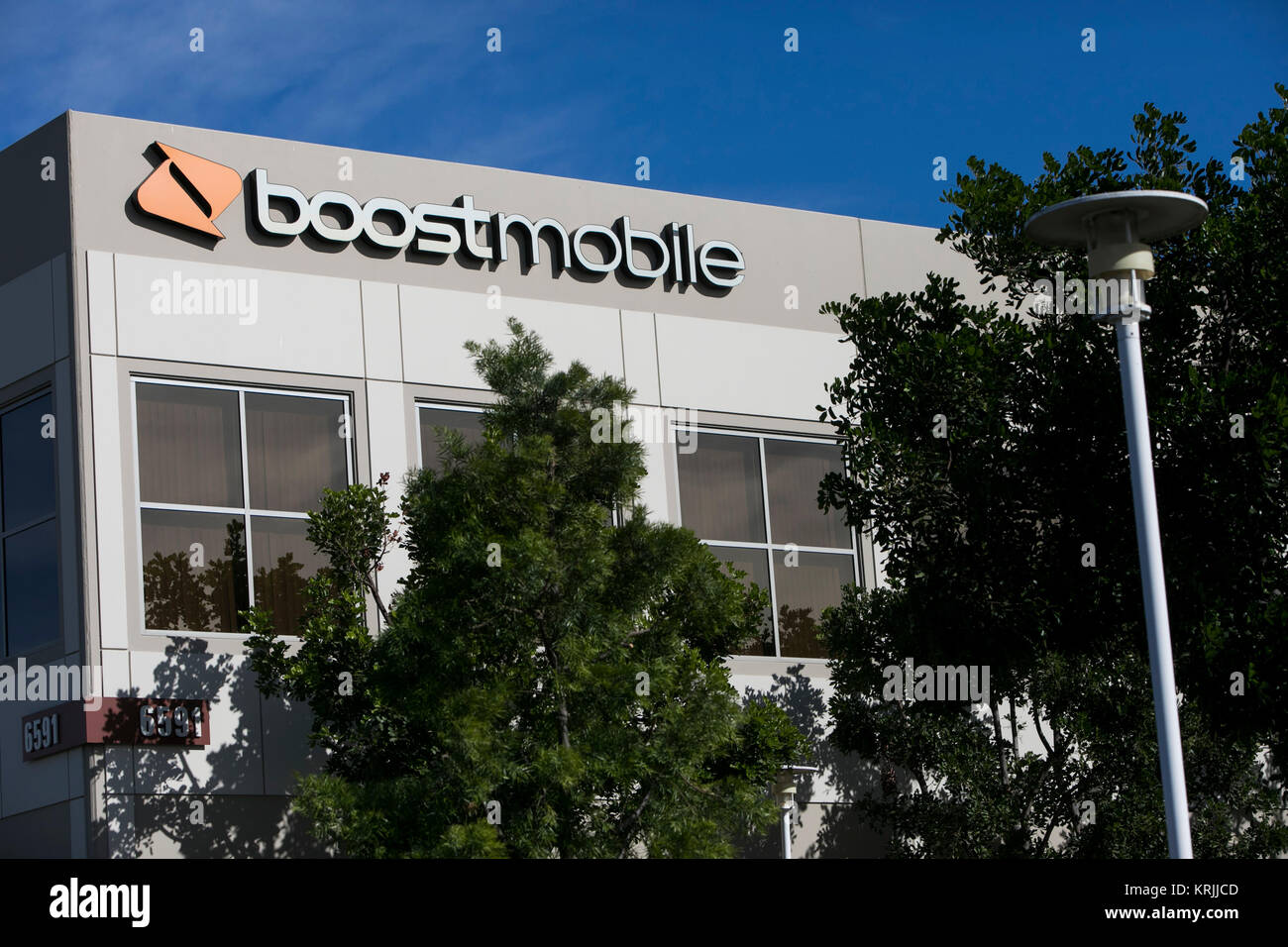 A logo sign outside of the headquarters of Boost Worldwide, Inc., in Irvine, California, on December 9, 2017. Stock Photo