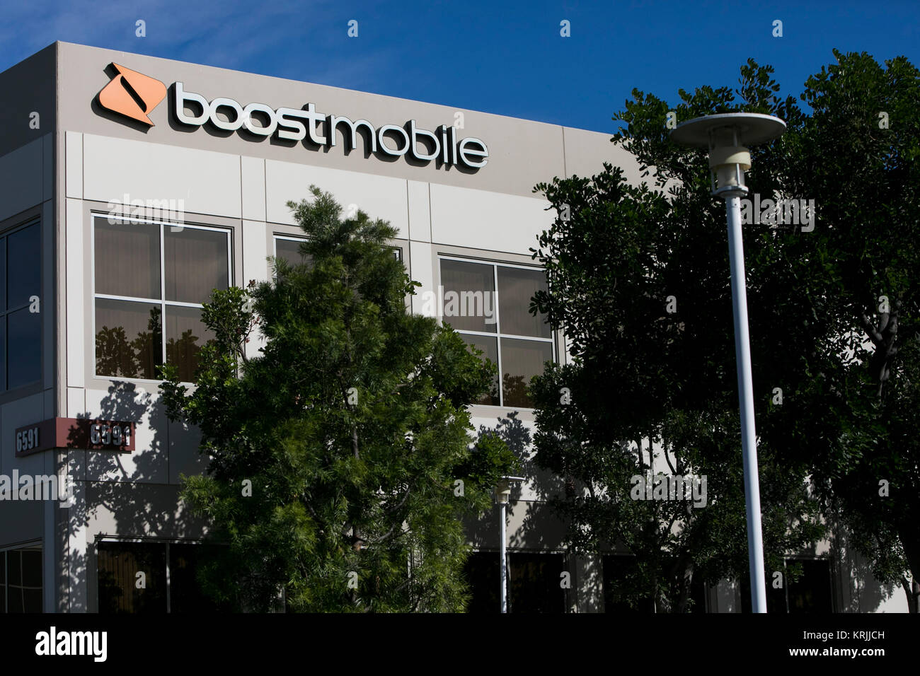 A logo sign outside of the headquarters of Boost Worldwide, Inc., in Irvine, California, on December 9, 2017. Stock Photo