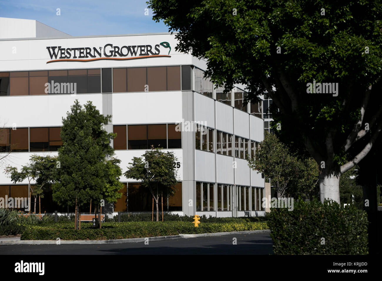 A logo sign outside of the headquarters of Western Growers in Irvine, California, on December 9, 2017. Stock Photo