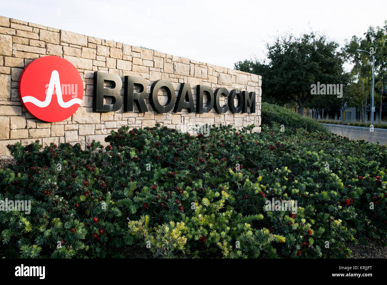 A logo sign outside of the headquarters of the Broadcom Corporation in