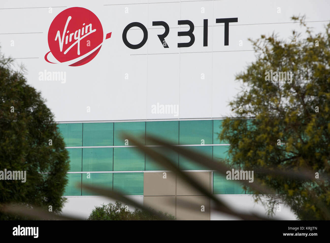 A logo sign outside of the headquarters of Virgin Orbit in Long Beach, California, on December 10, 2017. Stock Photo