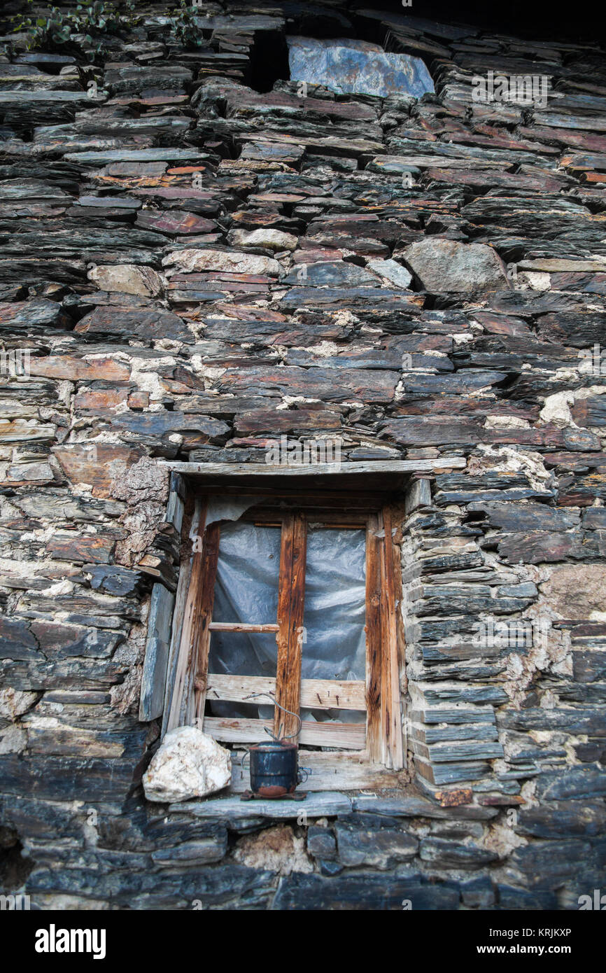 Broken window on stone wall Stock Photo - Alamy
