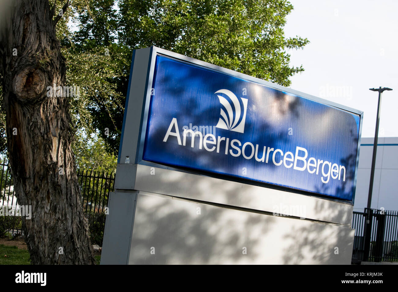 A logo sign outside of a facility occupied by the AmerisourceBergen ...
