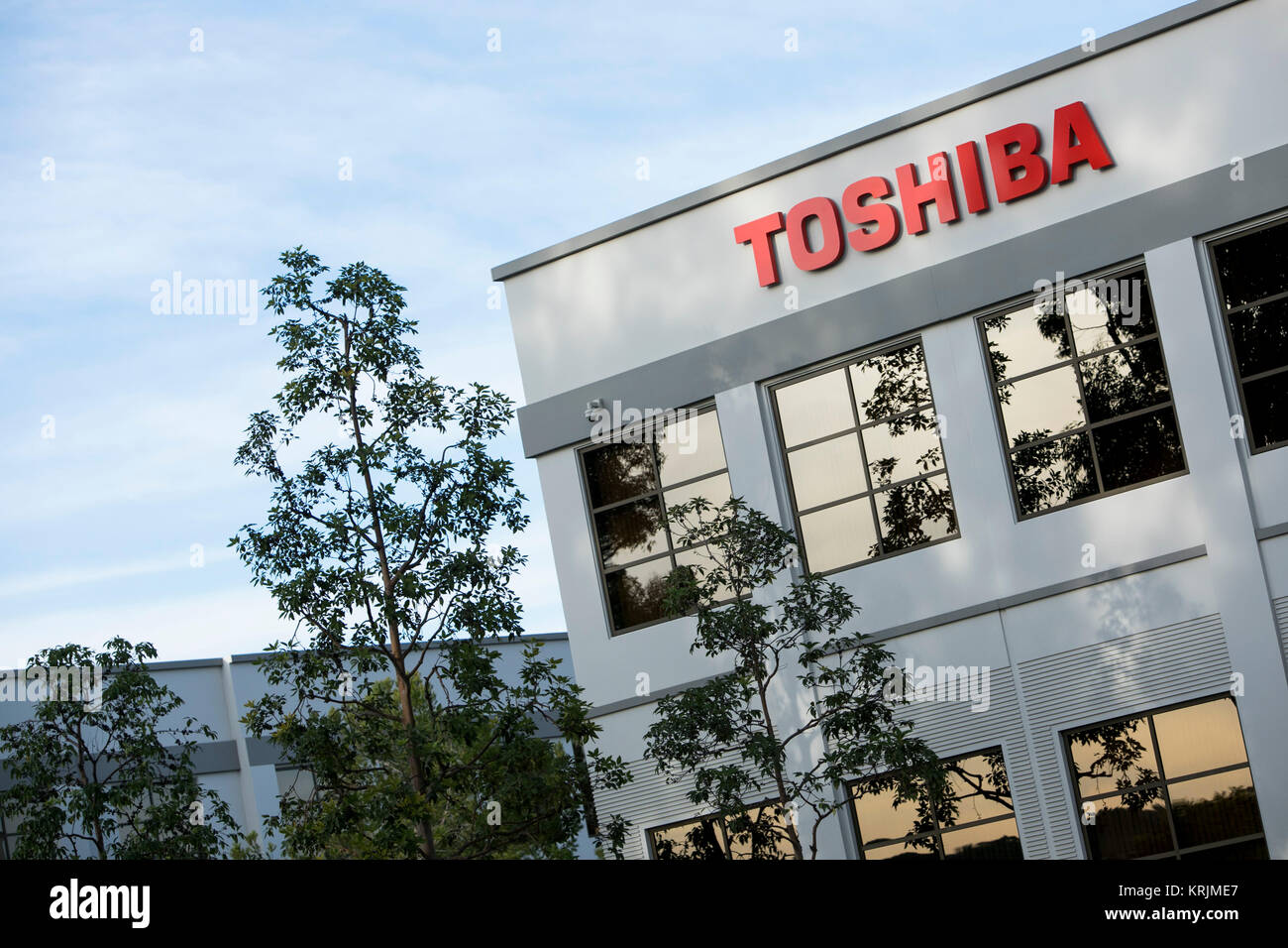 A logo sign outside of a facility occupied by the Toshiba Corporation in Irvine, California, on December 9, 2017. Stock Photo