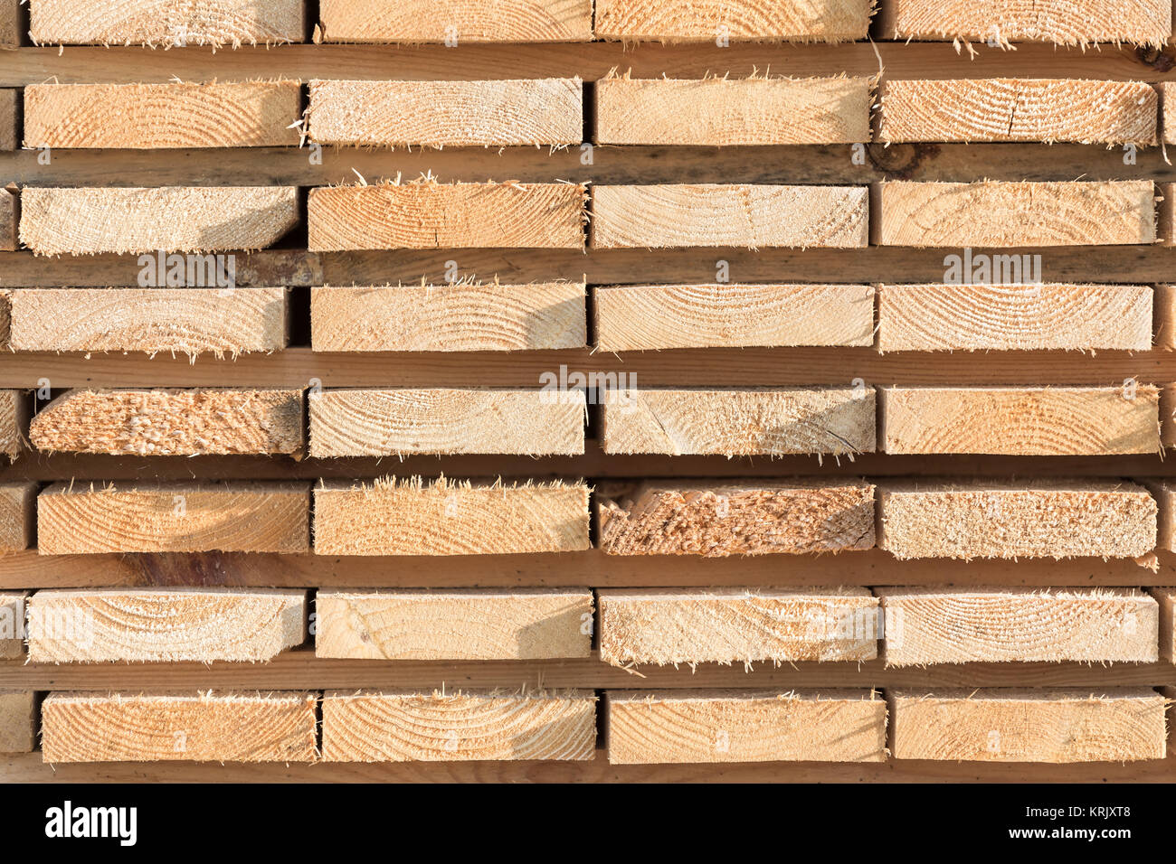 Stacked lumber background Stock Photo - Alamy