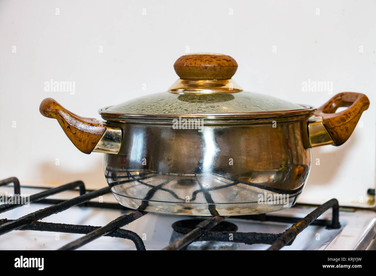 Pot on a gas stove Stock Photo Alamy