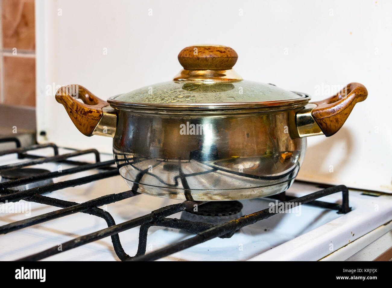Pot on a gas stove Stock Photo Alamy