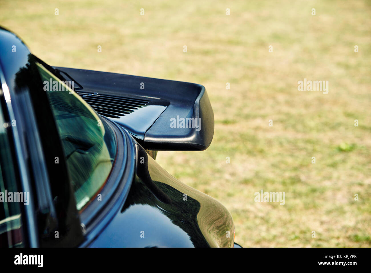 close up on dark blue sports car spoiler Stock Photo