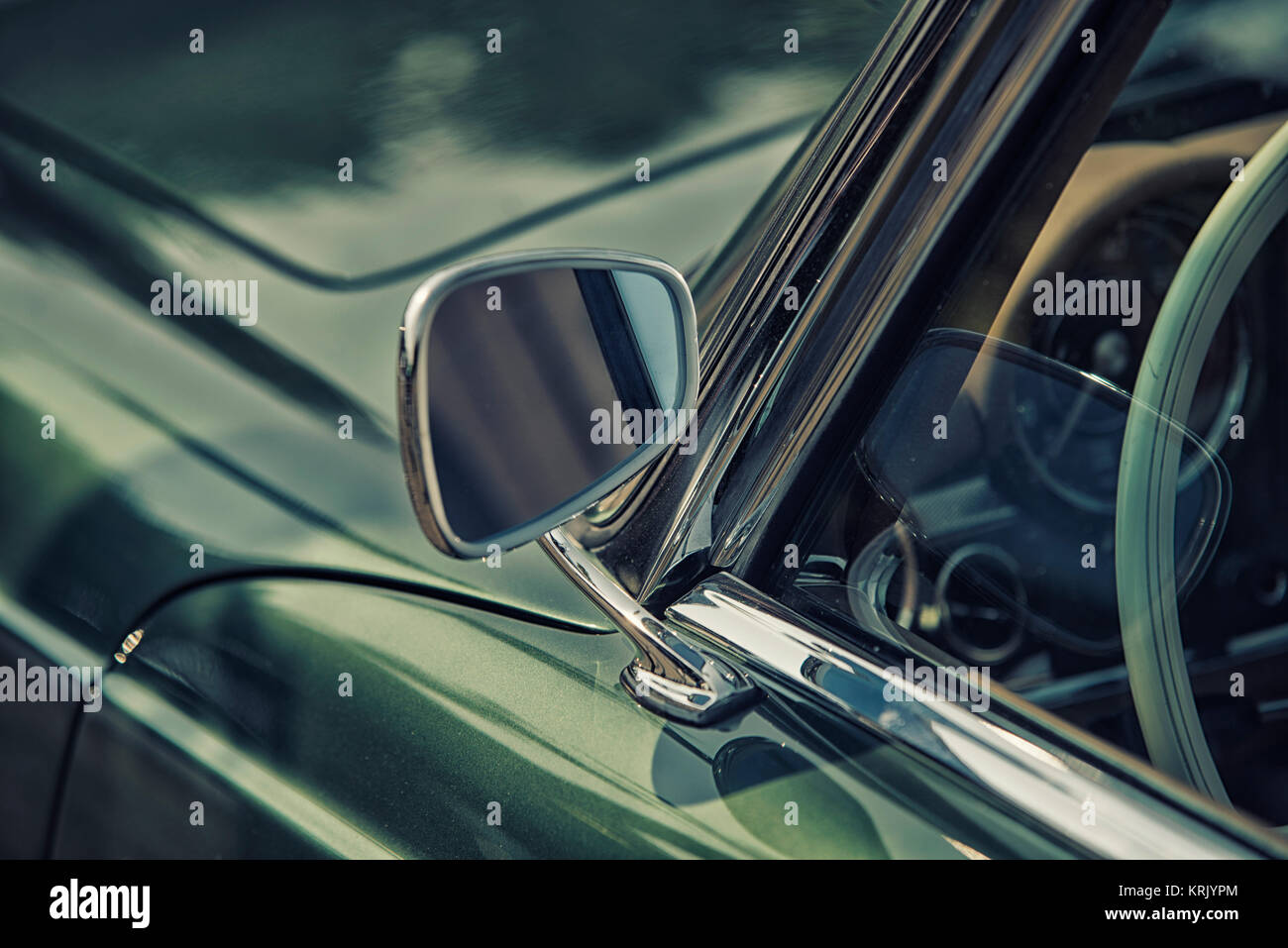 close up on rear view mirror on greenv intage car Stock Photo Alamy