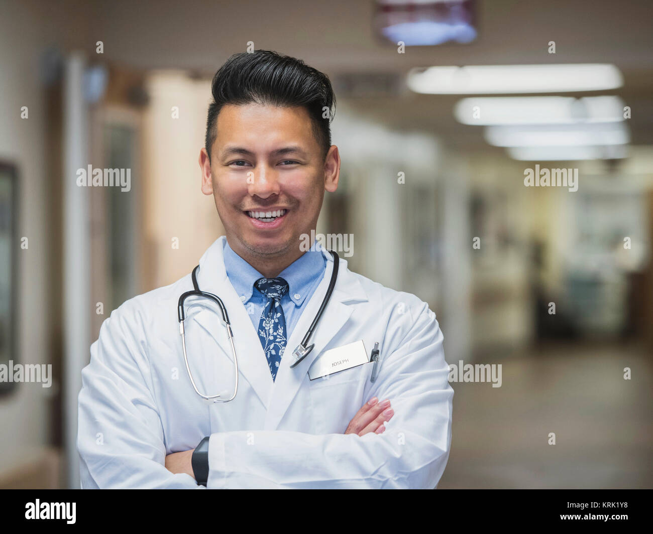 Portrait of confident Filipino doctor Stock Photo