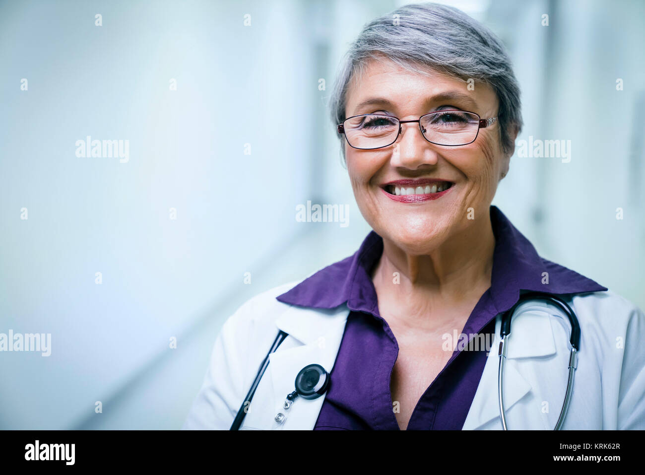 Portrait of smiling mixed race doctor Stock Photo