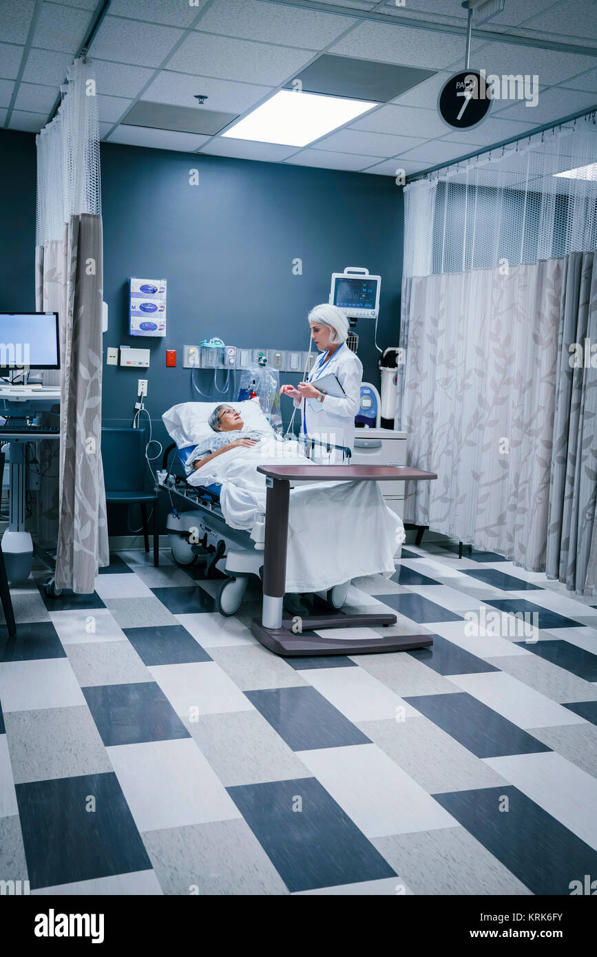 Hospital gown woman doctor hi-res stock photography and images - Alamy