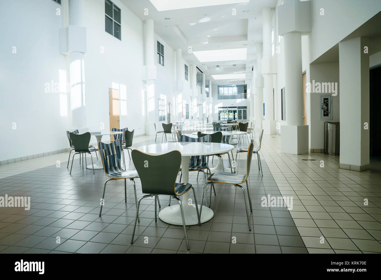 Empty table and chairs in lobby Stock Photo