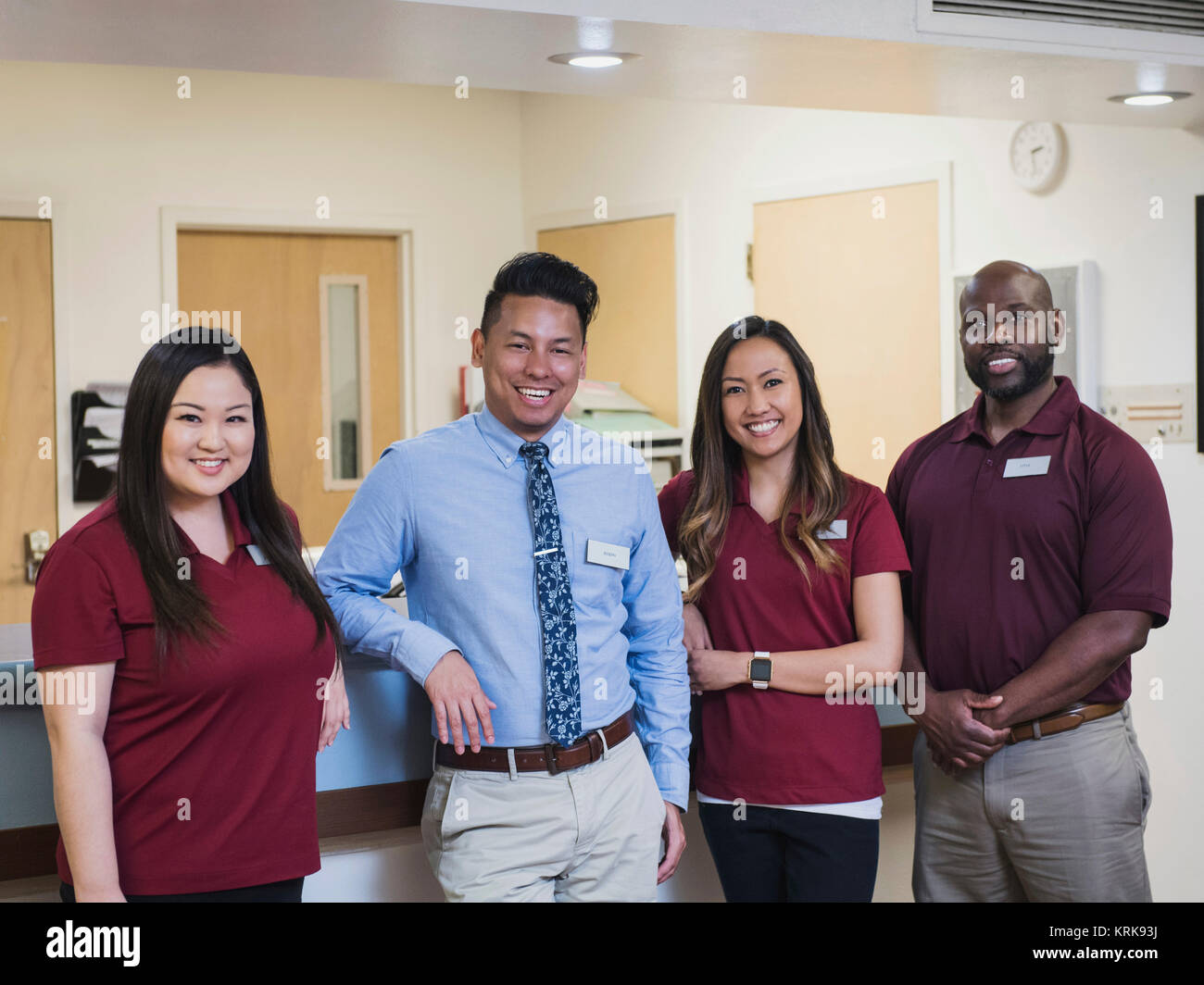 Portrait of smiling medical team in hospital Stock Photo