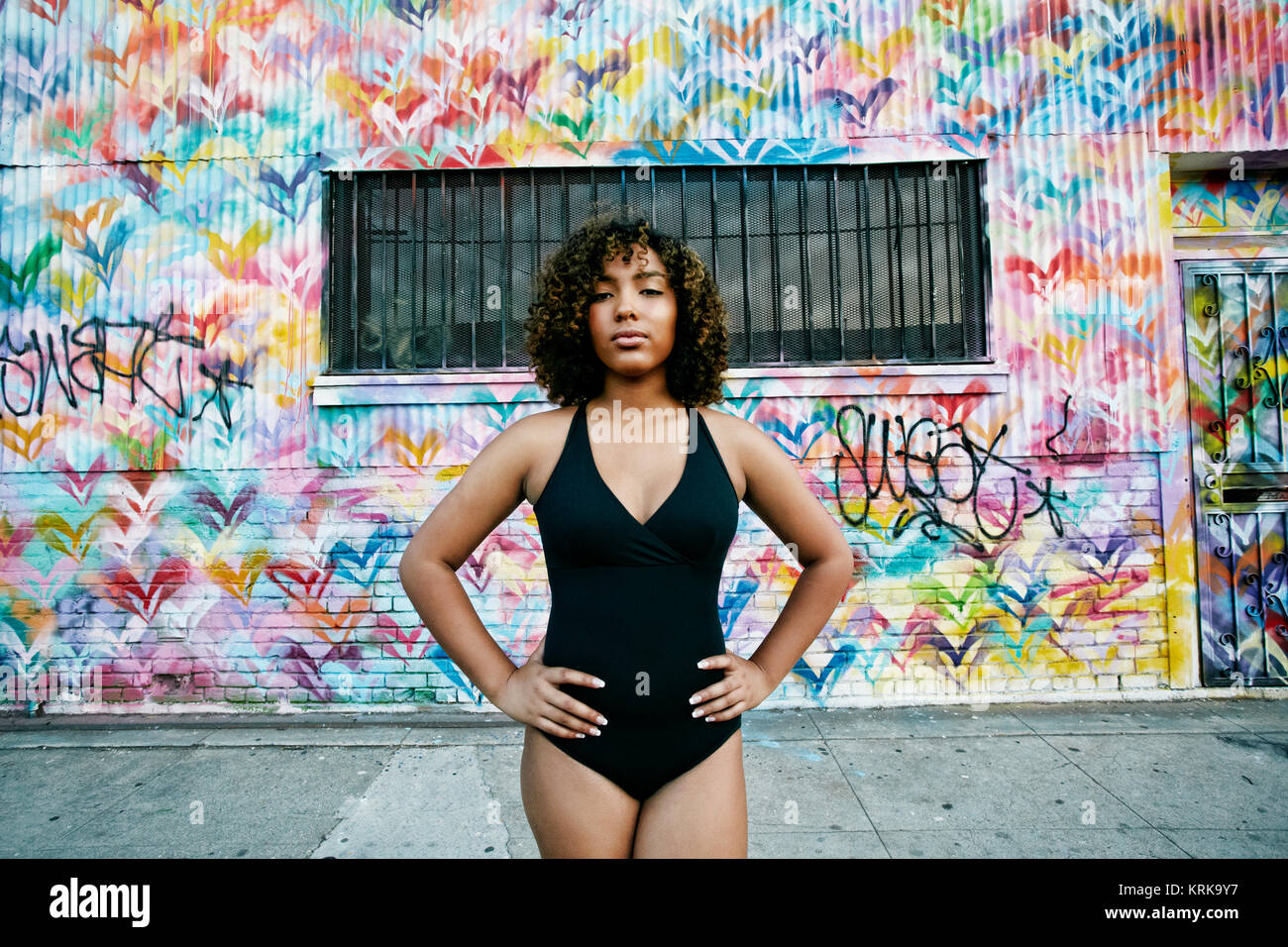 Portrait of confident mixed race ballet dancer in city Stock Photo