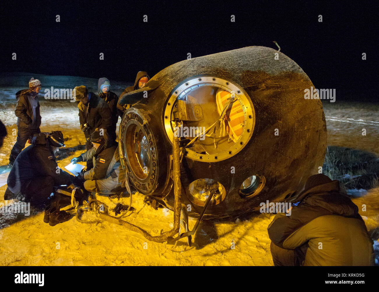 The Soyuz TMA-17M spacecraft is seen after it landed with Expedition 45 crew members Oleg Kononenko of the Russian Federal Space Agency (Roscosmos), Kjell Lindgren of NASA and Kimiya Yui of the Japan Aerospace Exploration Agency (JAXA) near the town of Zhezkazgan, Kazakhstan on Friday, Dec. 11, 2015. Kononenko, Lindgren, and Yui are returning after 141 days in space where they served as members of the Expedition 44 and 45 crews onboard the International Space Station. Photo Credit: (NASA/GCTC/Andrey Shelepin) Expedition 45 Soyuz TMA-17M Landing (NHQ201512110018) Stock Photo