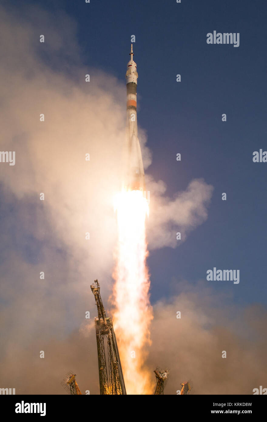 The Soyuz TMA-19M rocket is launched with Expedition 46 Soyuz Commander Yuri Malenchenko of the Russian Federal Space Agency (Roscosmos), Flight Engineer Tim Kopra of NASA, and Flight Engineer Tim Peake of ESA (European Space Agency), Tuesday, Dec. 15, 2015 at the Baikonur Cosmodrome in Kazakhstan.  Malenchenko, Kopra, and Peake will spend the next six-months living and working aboard the International Space Station.  Photo Credit: (NASA/Joel Kowsky) Expedition 46 Launch (NHQ201512150022) Stock Photo