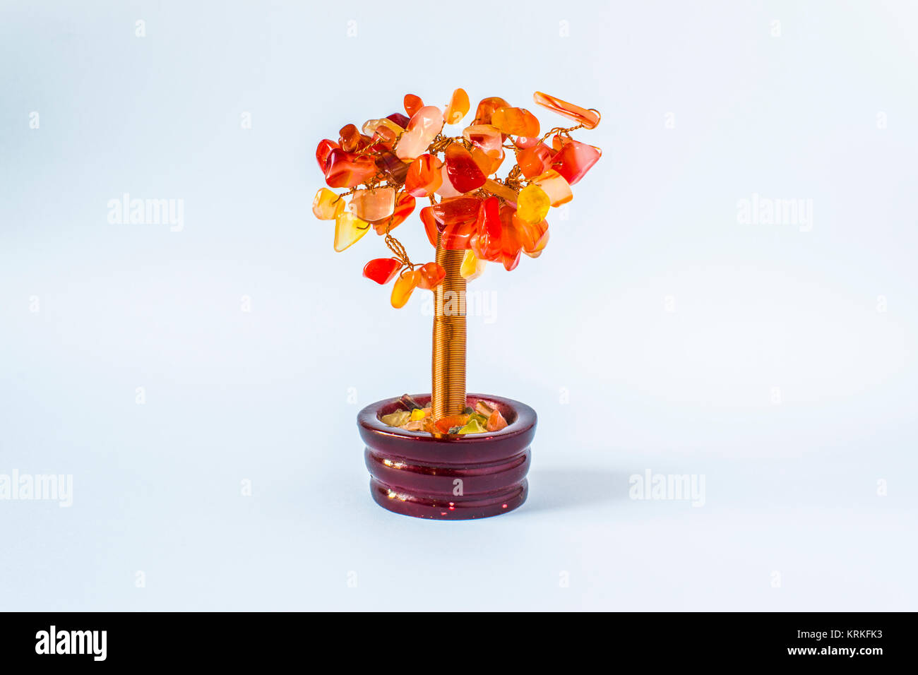 Money tree on a white background. Tree fountain money Stock Photo - Alamy