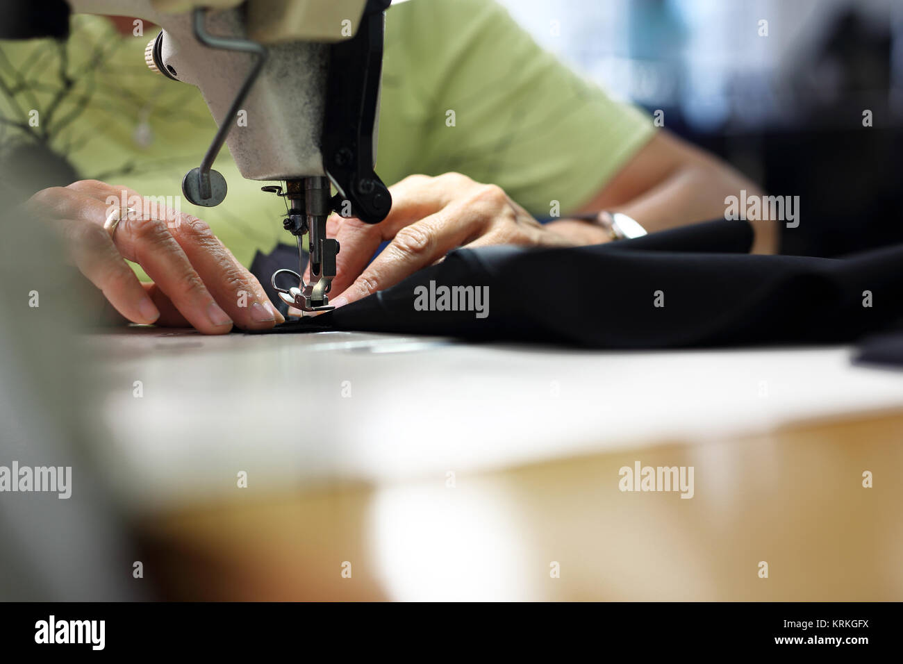 production of clothing,sewing machine overlock Stock Photo Alamy