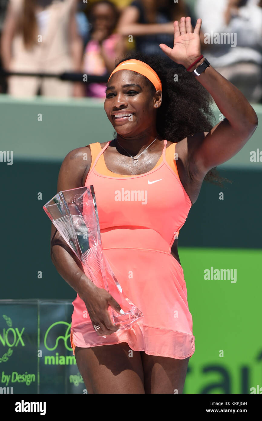 KEY BISCAYNE, FL - APRIL 04: Serena Williams poses with the Butch Buchholz Trophy as she stands with Martina Navratilova after defeating Carla Suarez Navarro of Spain after the Women's Finals match on day 13 of the Miami Open at Crandon Park Tennis Center on April 4, 2015 in Key Biscayne, Florida   People:  Serena Williams Stock Photo