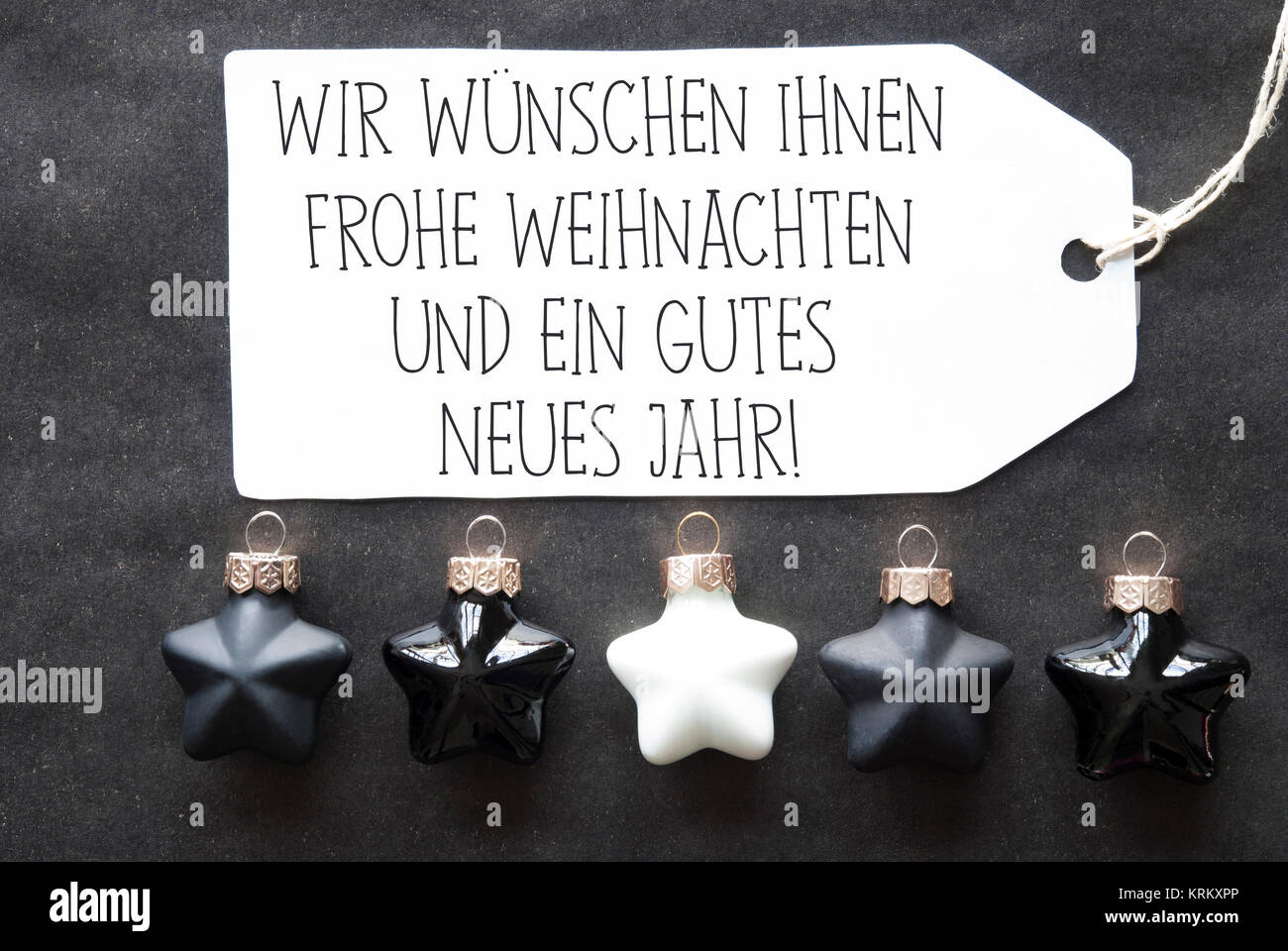 Label With German Text Wir Wuenschen Frohe Weihnachten Und Ein Gutes Neues Jahr Means Merry