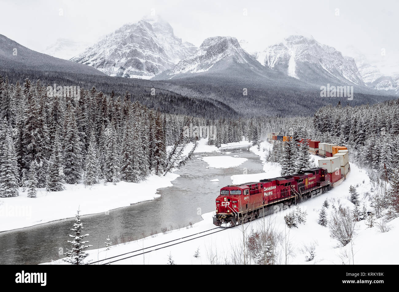 CPR loco 8871 leads intermodal train eastbound at Morants Curve - Banff Park - Alberta Stock Photo
