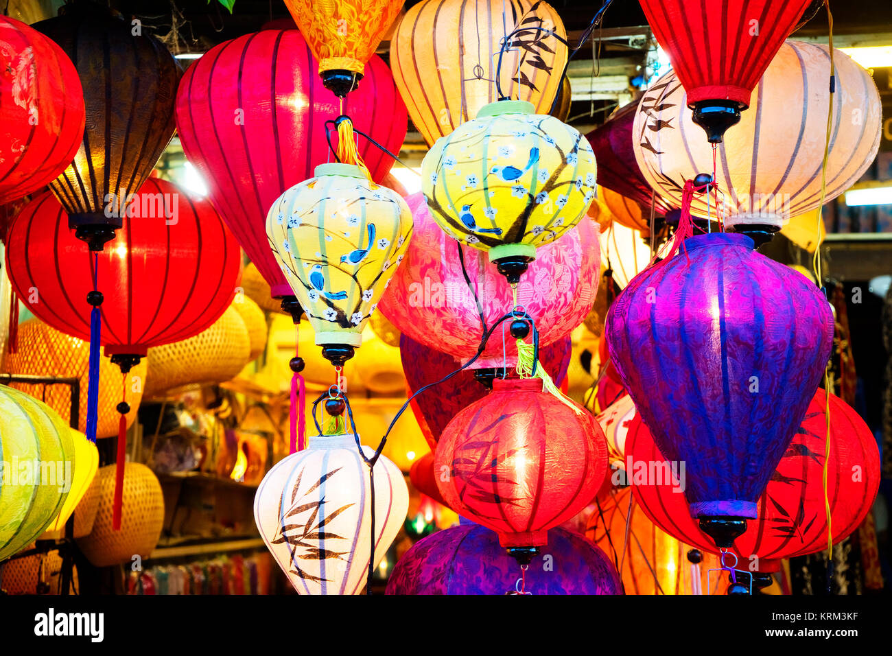 Colorful lanterns spread light on the old street of Hoi An Ancient Town - UNESCO World Heritage Site. Vietnam. Stock Photo