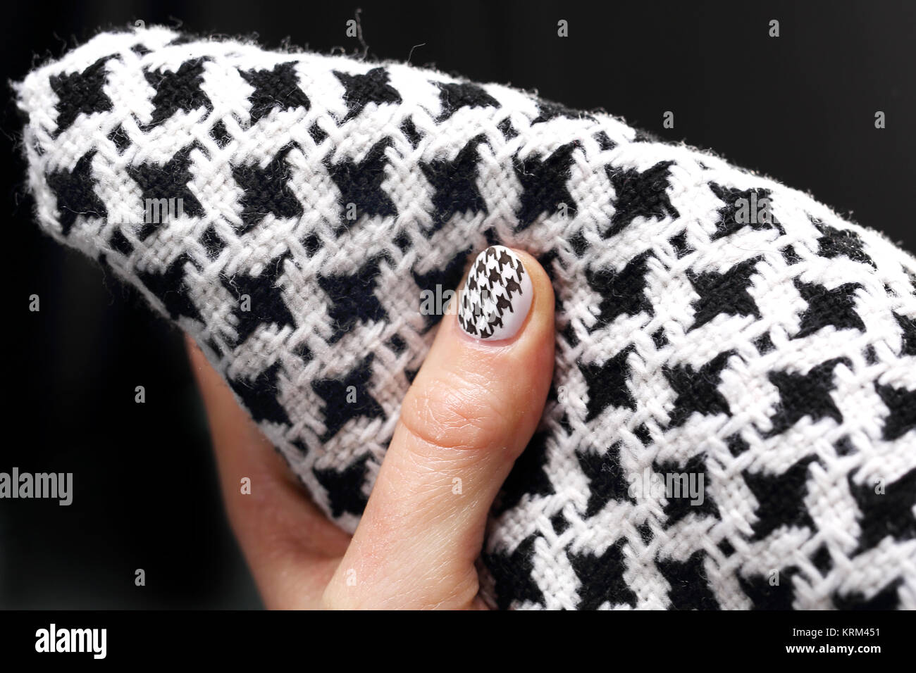 chanel grille,black and white pattern on the nails Stock Photo