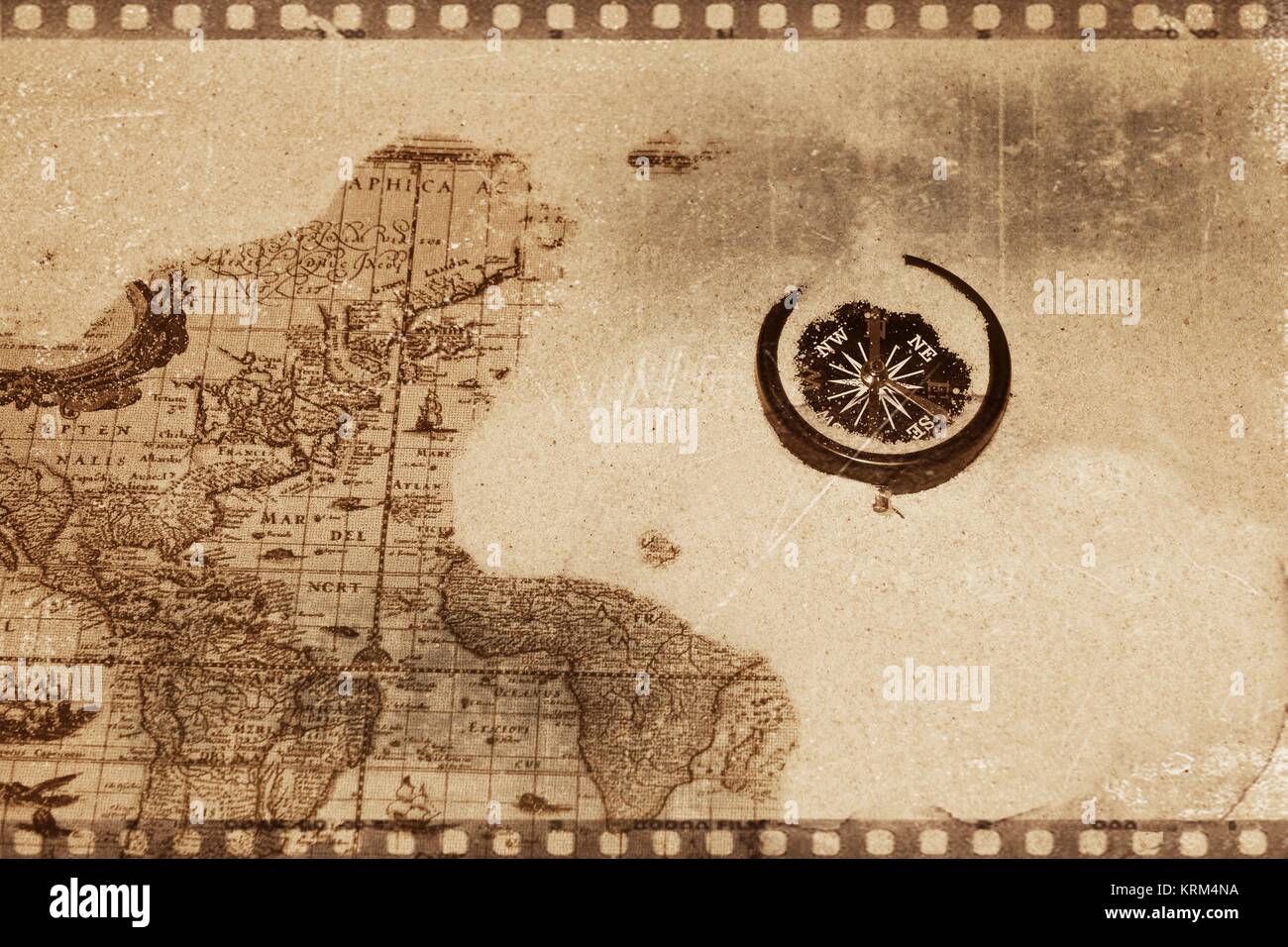 compass lies on old map Stock Photo - Alamy