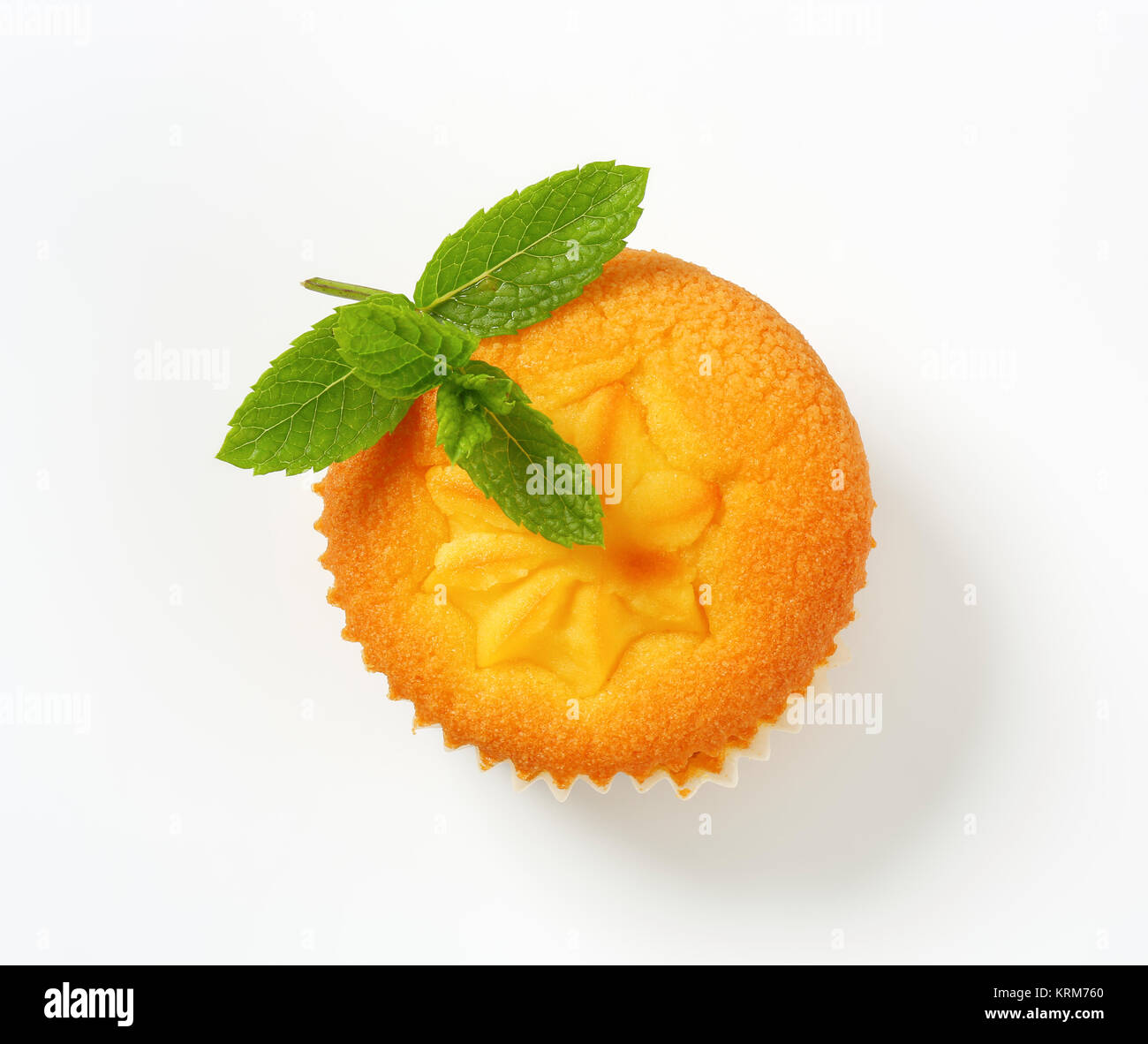 Pudding filled lemon cupcake Stock Photo Alamy
