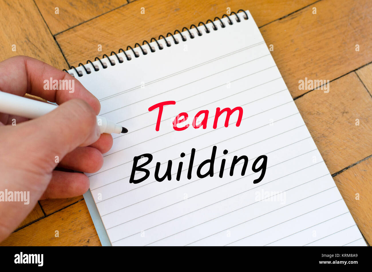 Team building text concept on notebook Stock Photo - Alamy