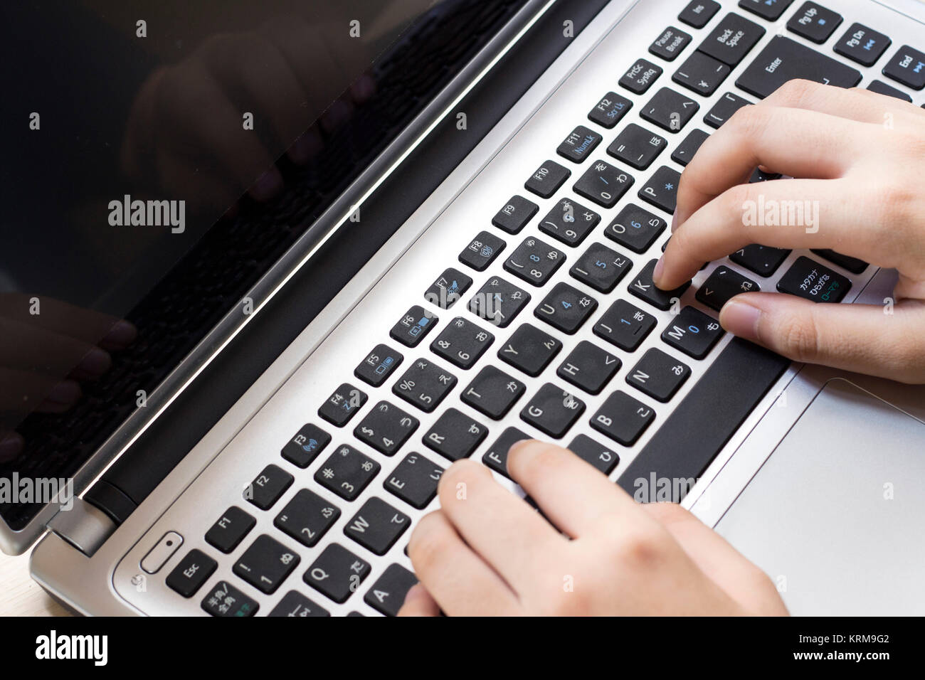 Using laptop computer Stock Photo - Alamy