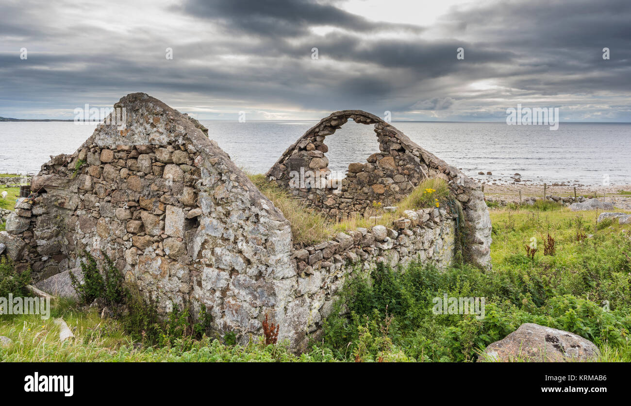 Derelict granite stone house at Bloody Foreland, at the north-west tip of County Donegal, Ireland Stock Photo