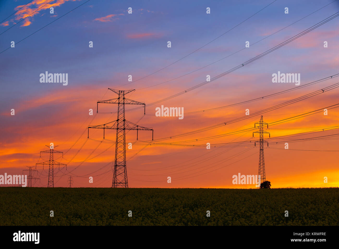 Silhouette of high voltage electrical pole structure at sunset Stock ...