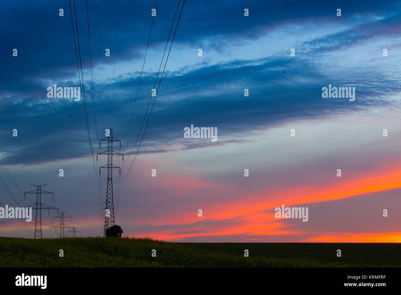 Silhouette of high voltage electrical pole structure at sunset Stock ...