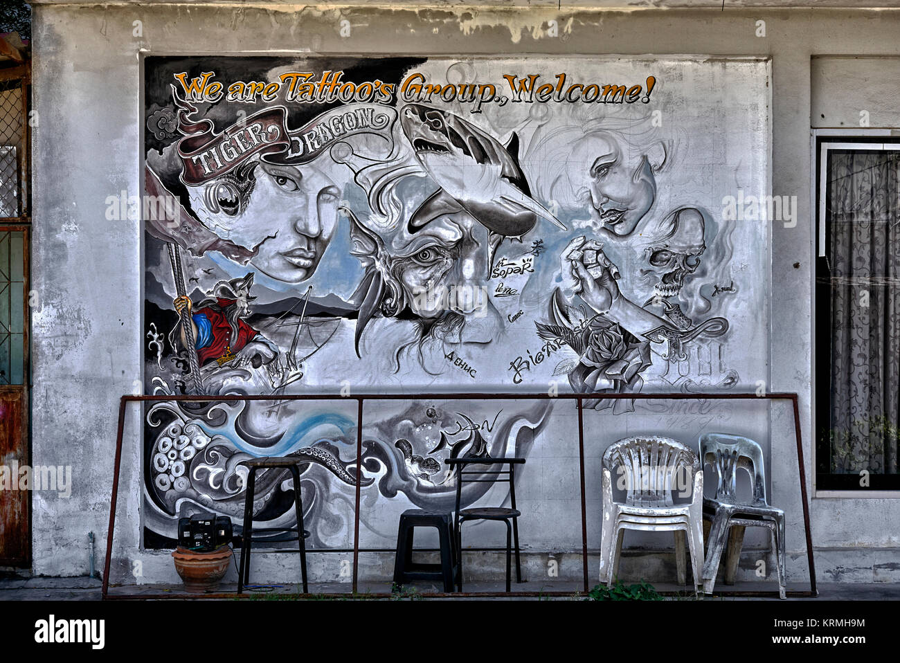 Tattoo shop wall art graffiti advertising Stock Photo