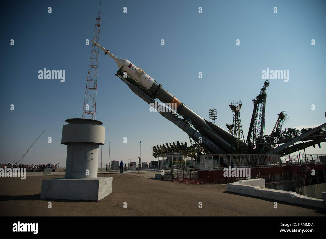 The Soyuz MS-01 spacecraft is raised vertical after it was rolled out by train to the launch pad at the Baikonur Cosmodrome, Kazakhstan, Monday, July 4, 2016. NASA astronaut Kate Rubins, cosmonaut Anatoly Ivanishin of the Russian space agency Roscosmos, and astronaut Takuya Onishi of the Japan Aerospace Exploration Agency (JAXA) will launch from the Baikonur Cosmodrome in Kazakhstan the morning of July 7, Kazakh time (July 6 Eastern time.) All three will spend approximately four months on the orbital complex, returning to Earth in October. Photo Credit: (NASA/Bill Ingalls) Expedition 48 Soyuz  Stock Photo