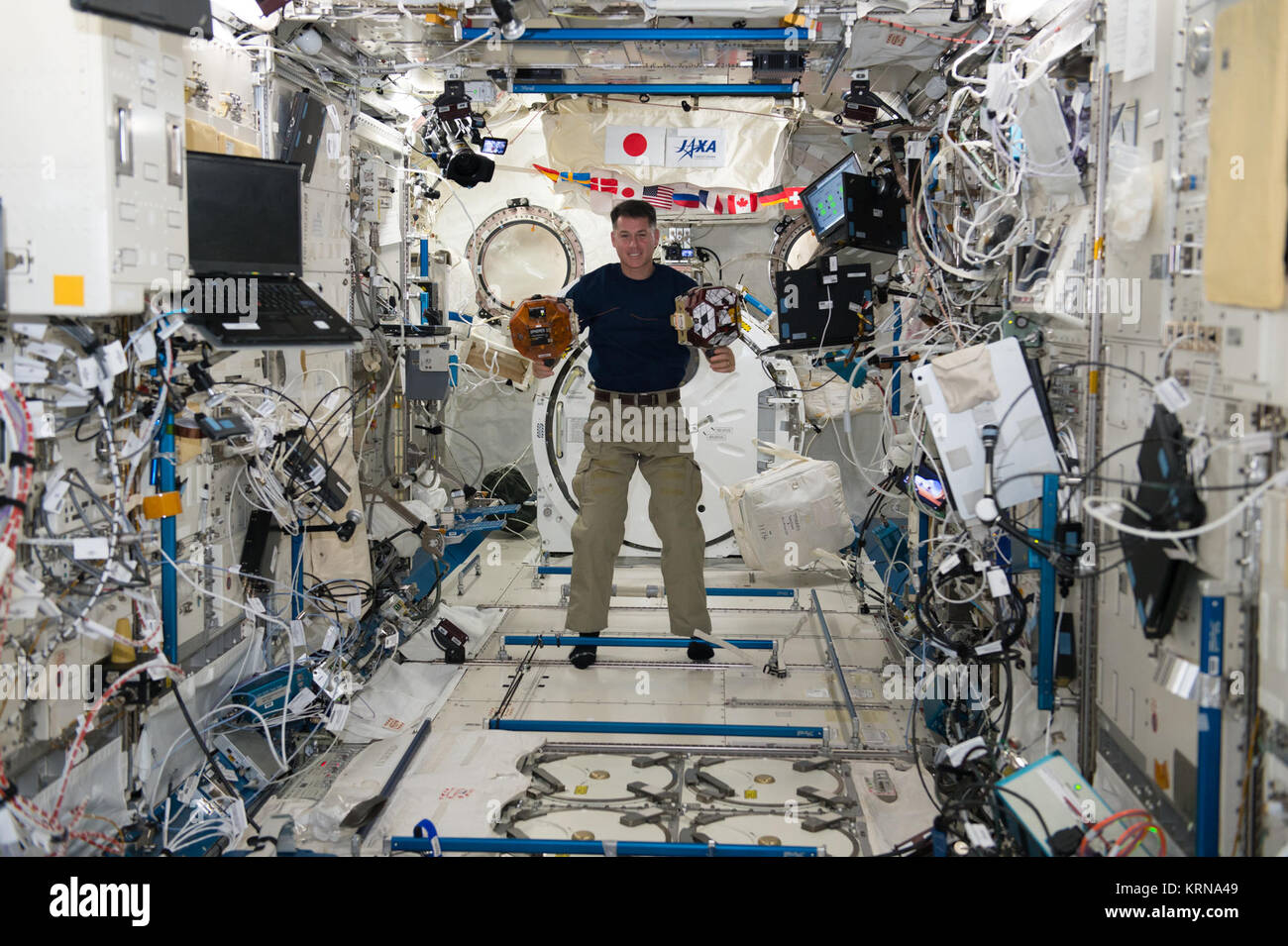 ISS-50 Shane Kimbrough with SPHERES in the Kibo lab Stock Photo