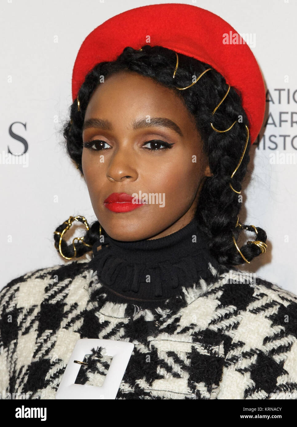 American musical recording artist, actress, and model Janelle Monáe arrives on the red carpet for a screening of the film “Hidden Figures” at the Smithsonian’s National Museum of African American History and Culture, Wednesday, Dec. 14, 2016 in Washington DC. The film is based on the book of the same title, by Margot Lee Shetterly, and chronicles the lives of Katherine Johnson, Dorothy Vaughan and Mary Jackson -- African-American women working at NASA as “human computers,” who were critical to the success of John Glenn’s Friendship 7 mission in 1962. Photo Credit: (NASA/Joel Kowsky) Janelle Mo Stock Photo