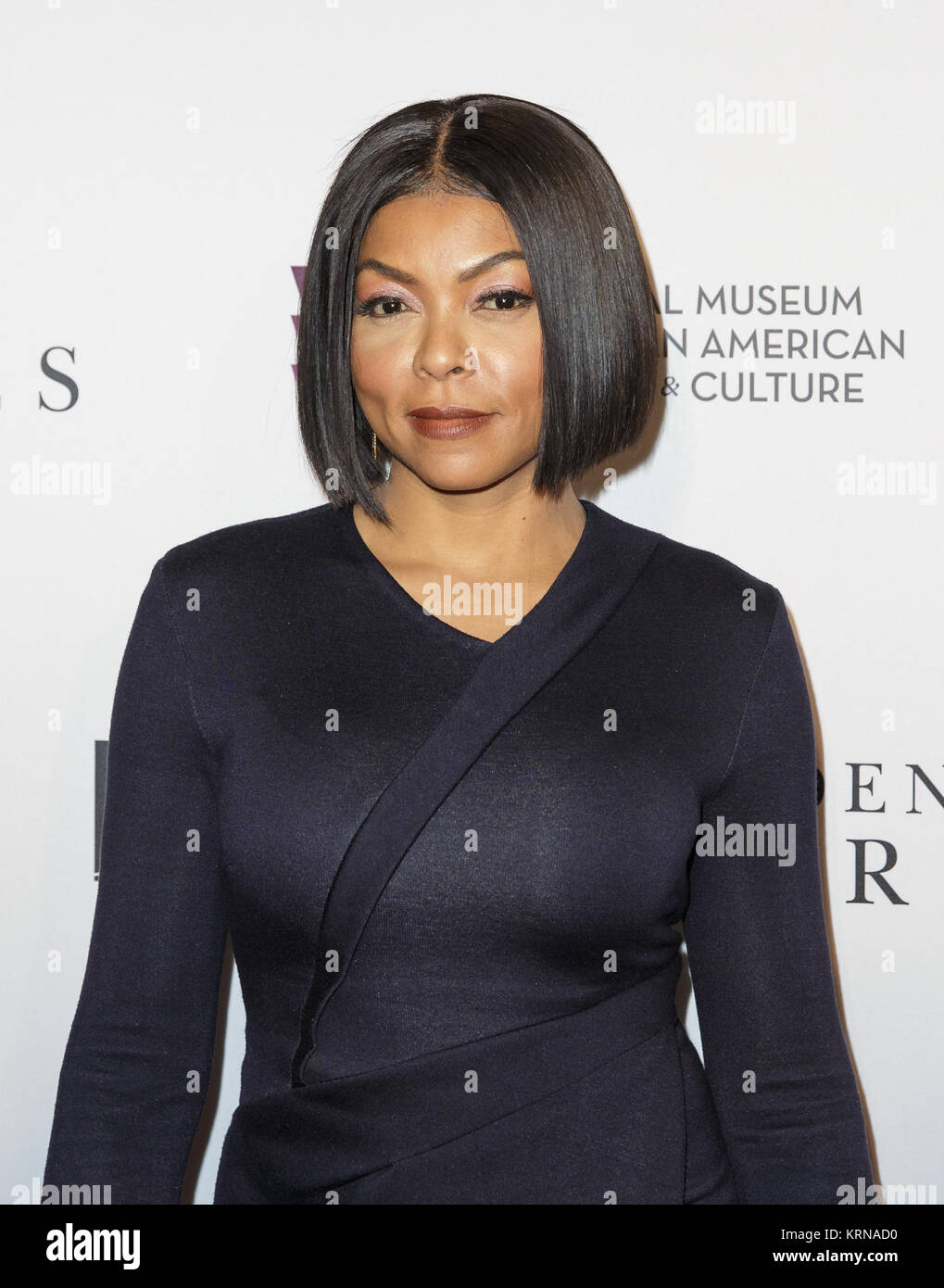 American actress and singer Taraji P. Henson arrives on the red carpet for a screening of the film “Hidden Figures” at the Smithsonian’s National Museum of African American History and Culture, Wednesday, Dec. 14, 2016 in Washington DC. The film is based on the book of the same title, by Margot Lee Shetterly, and chronicles the lives of Katherine Johnson, Dorothy Vaughan and Mary Jackson -- African-American women working at NASA as “human computers,” who were critical to the success of John Glenn’s Friendship 7 mission in 1962. Photo Credit: (NASA/Joel Kowsky) 22Hidden Figures22 Screening at N Stock Photo
