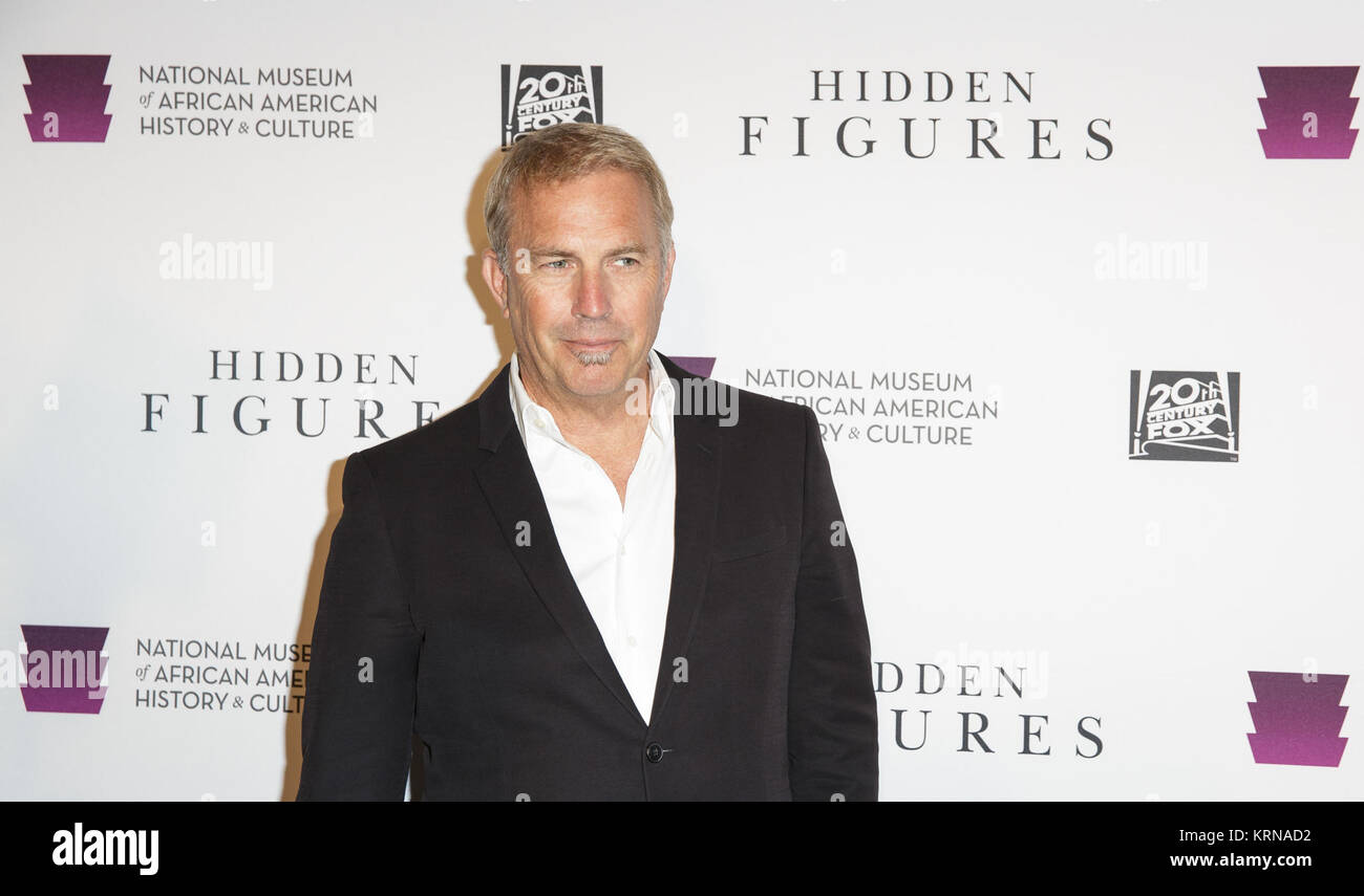 American actor, film director, and producer Kevin Costner arrives on the red carpet for a screening of the film “Hidden Figures” at the Smithsonian’s National Museum of African American History and Culture, Wednesday, Dec. 14, 2016 in Washington DC. The film is based on the book of the same title, by Margot Lee Shetterly, and chronicles the lives of Katherine Johnson, Dorothy Vaughan and Mary Jackson -- African-American women working at NASA as “human computers,” who were critical to the success of John Glenn’s Friendship 7 mission in 1962. Photo Credit: (NASA/Joel Kowsky) 22Hidden Figures22 S Stock Photo