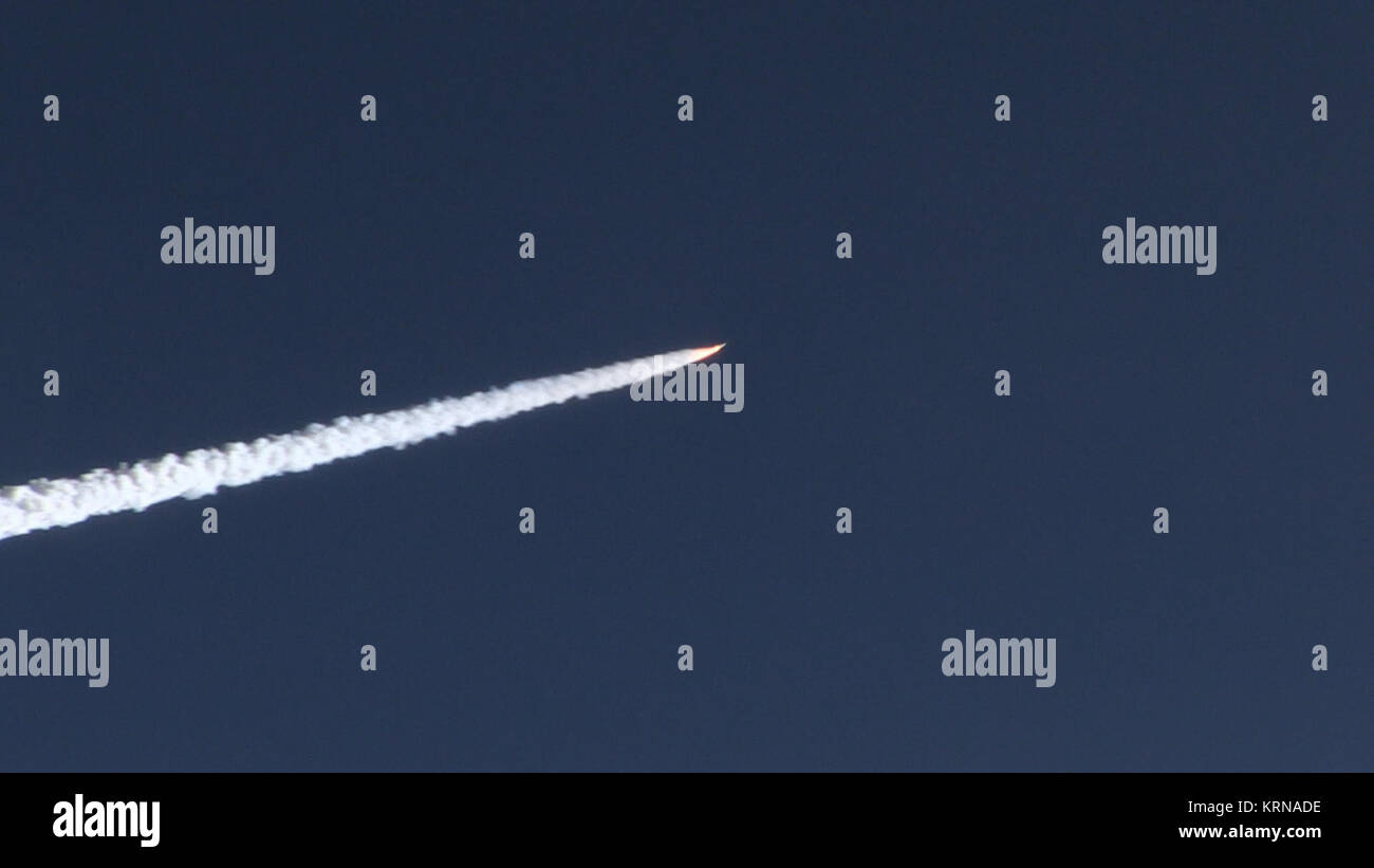 The Orbital ATK Pegasus XL rocket carrying NASA's Cyclone Global Navigation Satellite System, or CYGNSS, spacecraft is released and the first stage ignites at 8:37 a.m. EST.  The rocket was released from the Orbital ATK L-1011 Stargazer aircraft flying over the Atlantic Ocean offshore from Daytona Beach, Florida following takeoff from the Skid Strip at Cape Canaveral Air Force Station. This image was taken from a NASA F-18 chase plane provided by Armstrong Flight Research Center in California. The CYGNSS satellites will make frequent and accurate measurements of ocean surface winds throughout  Stock Photo