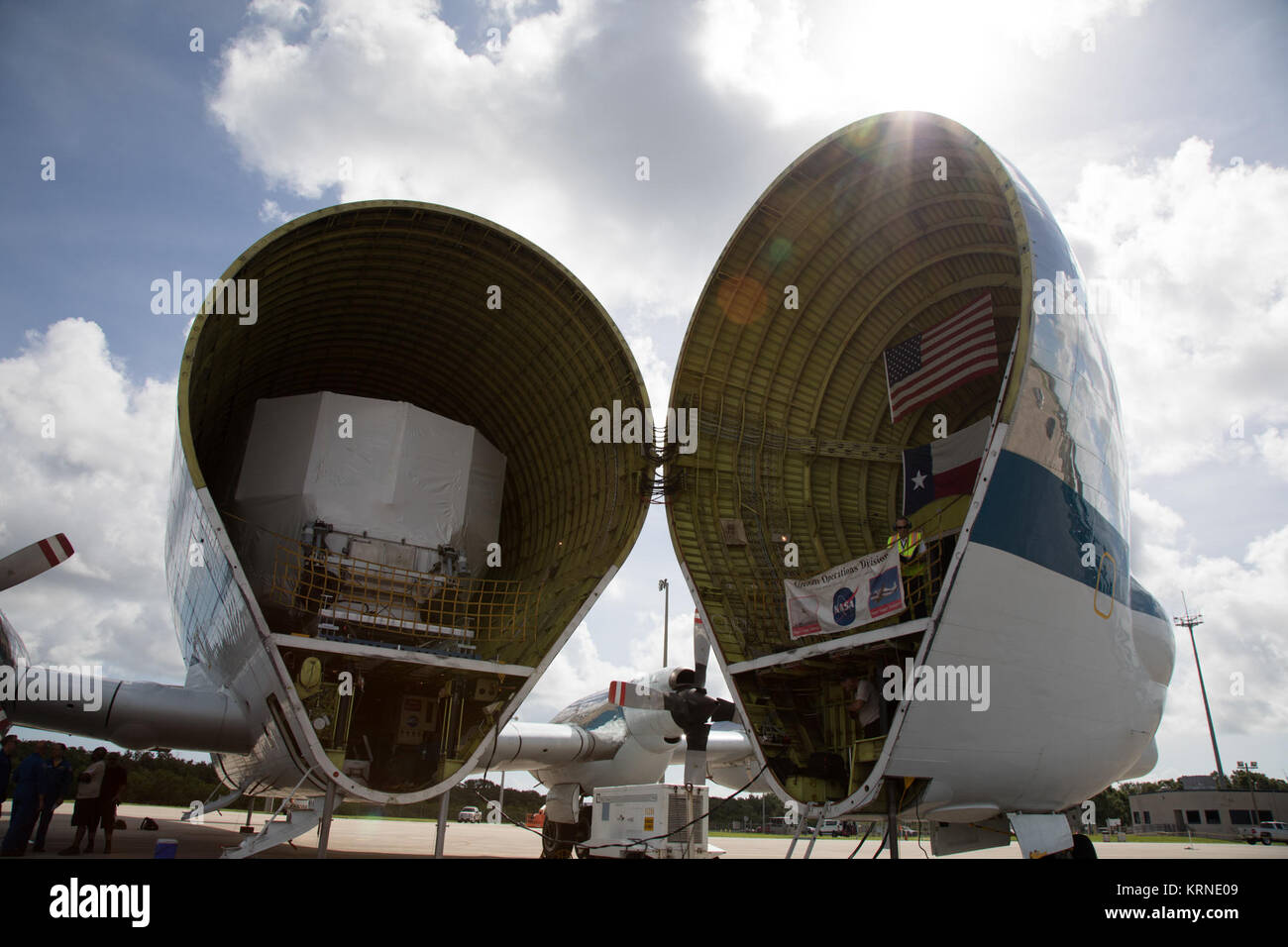 The Orion service module structural test article for Exploration Mission-1 (EM-1), built by the European Space Agency, is secured inside NASA's Super Guppy aircraft at Kennedy Space Center's Shuttle Landing Facility, managed by Space Florida. The module will be shipped to Lockheed Martin's Denver facility to undergo testing. The Orion spacecraft will launch atop the agency's Space Launch System rocket on EM-1 in 2019. NASA 941 Super Guppy lands to pick up EM-1 Orion Service Module structural test article (KSC-20170623-PH-GEB01 0025) Stock Photo