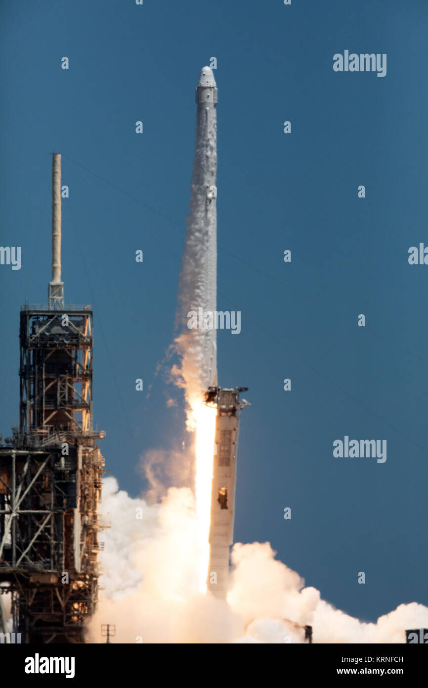 The two-stage Falcon 9 launch vehicle lifts off Launch Complex 39A at NASA's Kenney Space Center carrying the Dragon resupply spacecraft to the International Space Station. Liftoff was at 12:31 p.m. EDT. On its 12th commercial resupply services mission to the International Space Station, Dragon will bring up more than 6,400 pounds of supplies and new science experiments and equipment for technology research. KSC-20170814-PH KLS02 0034 (35735220654) Stock Photo