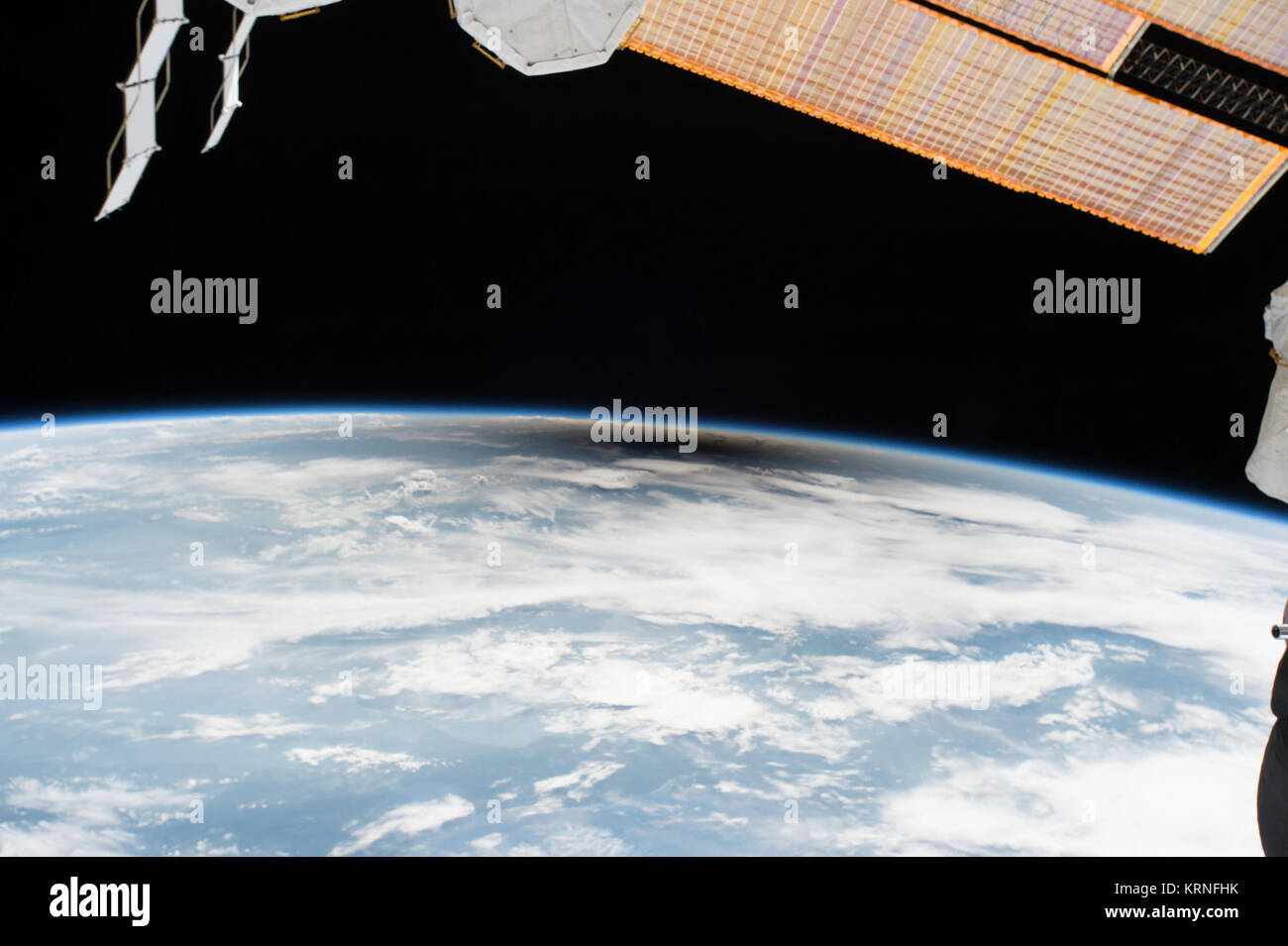 iss052e056222 (Aug. 21, 2017) --- As millions of people across the United States experienced a total eclipse as the umbra, or moon’s shadow passed over them, only six people witnessed the umbra from space. Viewing the eclipse from orbit were NASA’s Randy Bresnik, Jack Fischer and Peggy Whitson, ESA (European Space Agency’s) Paolo Nespoli, and Roscosmos’ Commander Fyodor Yurchikhin and Sergey Ryazanskiy. The space station crossed the path of the eclipse three times as it orbited above the continental United States at an altitude of 250 miles. ISS-52 Eclipse 2017 Umbra Viewed from Space (2) Stock Photo