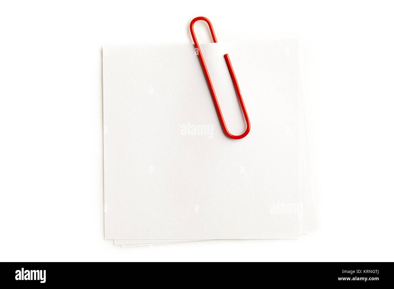 paperclip on blank note Stock Photo