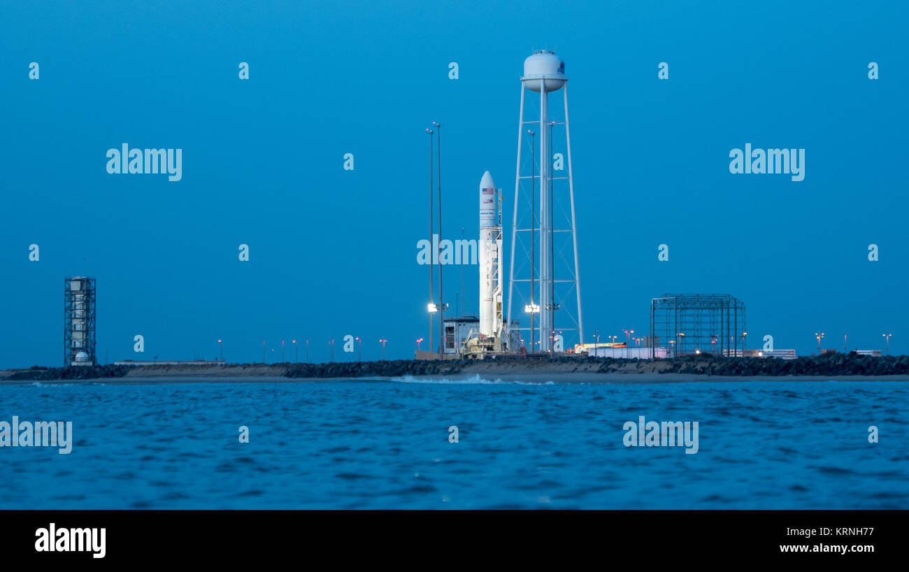 The Orbital ATK Antares rocket, with the Cygnus spacecraft onboard, is seen on launch Pad-0A, Friday, Nov. 10, 2017 at NASA's Wallops Flight Facility in Virginia. Orbital ATK’s eighth contracted cargo resupply mission with NASA to the International Space Station will deliver approximately 7,400 pounds of science and research, crew supplies and vehicle hardware to the orbital laboratory and its crew. Photo Credit: (NASA/Bill Ingalls) Antares Orbital ATK-8 Mission (NHQ201711100002) Stock Photo