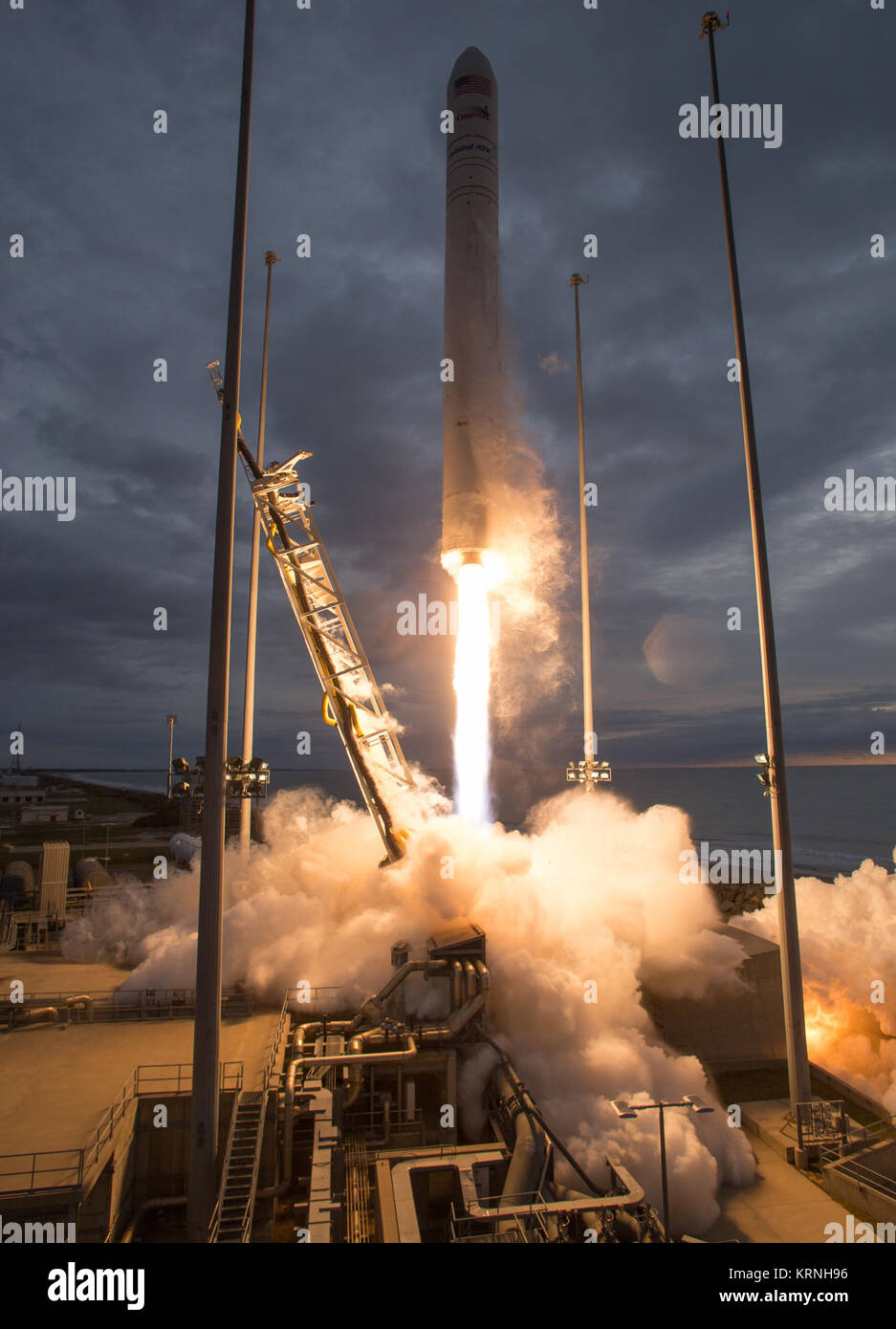 The Orbital ATK Antares rocket, with the Cygnus spacecraft onboard, launches from Pad-0A, Sunday, Nov. 12, 2017 at NASA's Wallops Flight Facility in Virginia. Orbital ATK’s eighth contracted cargo resupply mission with NASA to the International Space Station will deliver approximately 7,400 pounds of science and research, crew supplies and vehicle hardware to the orbital laboratory and its crew. Photo Credit: (NASA/Bill Ingalls) Orbital ATK CRS-8 Launch (NHQ201711120014) Stock Photo