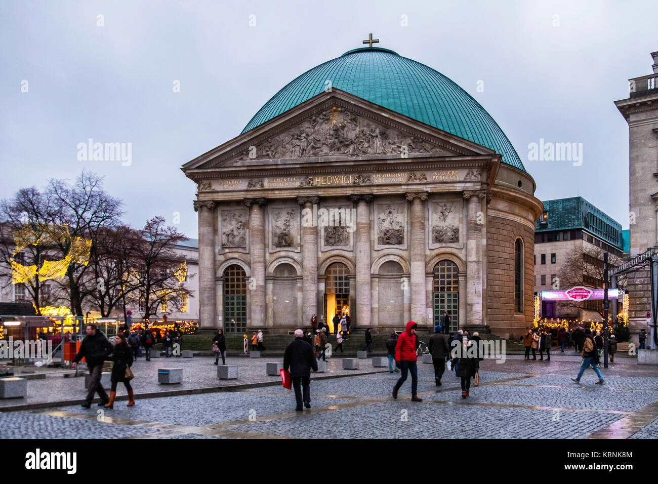 St. Hedwig's Cathedral, Berlin. Neoclassical facade Roman Catholic Church and Christmas market